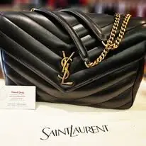 Sac matelassé noir à chaîne dorée restauré