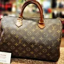 Sac monogrammé en toile et cuir naturel restauré